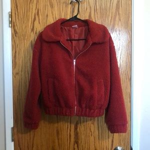 red woman’s puffy jacket